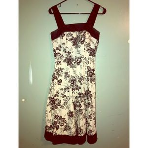 Cream A-line dress with black flower patterns